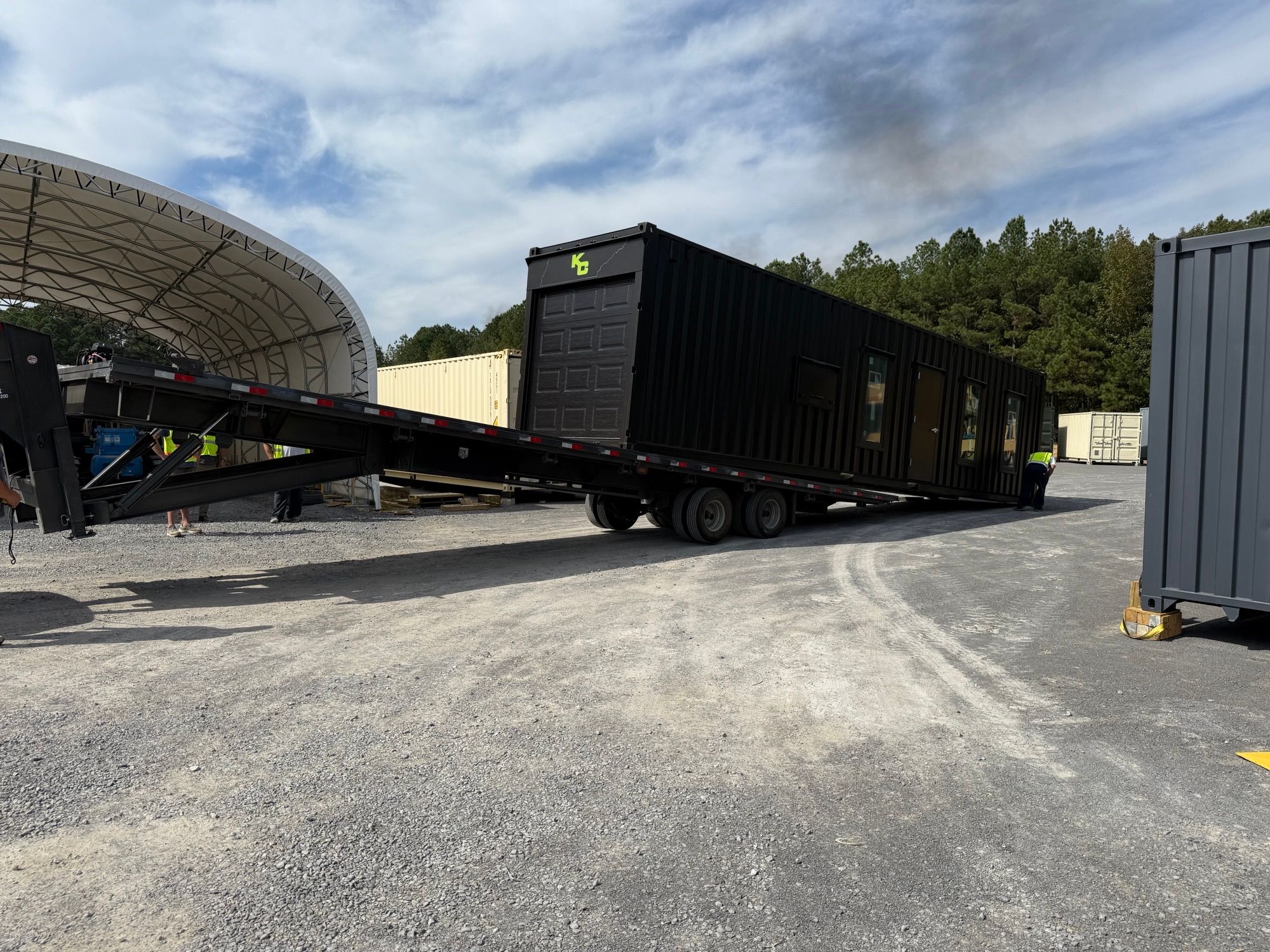 A custom built Rebox Solutions 40' high cube being delivered directly to the customer's site.