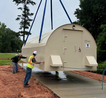 A community storm shelter being installed by Safe-T-Shelter.
